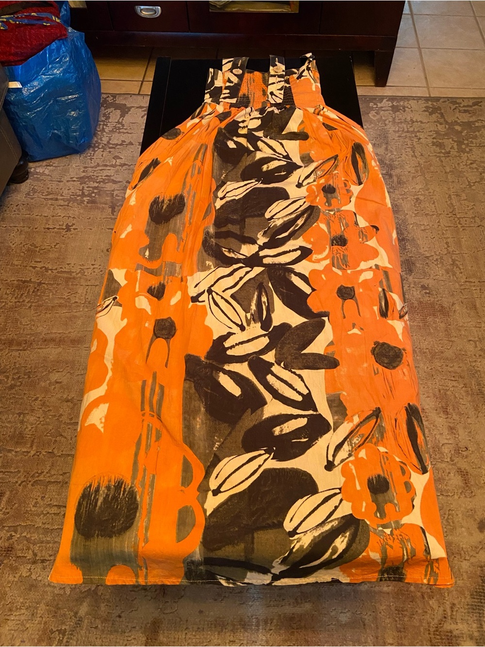 Sleeveless Orange Floral Maxi Dress with Bold Black Accents